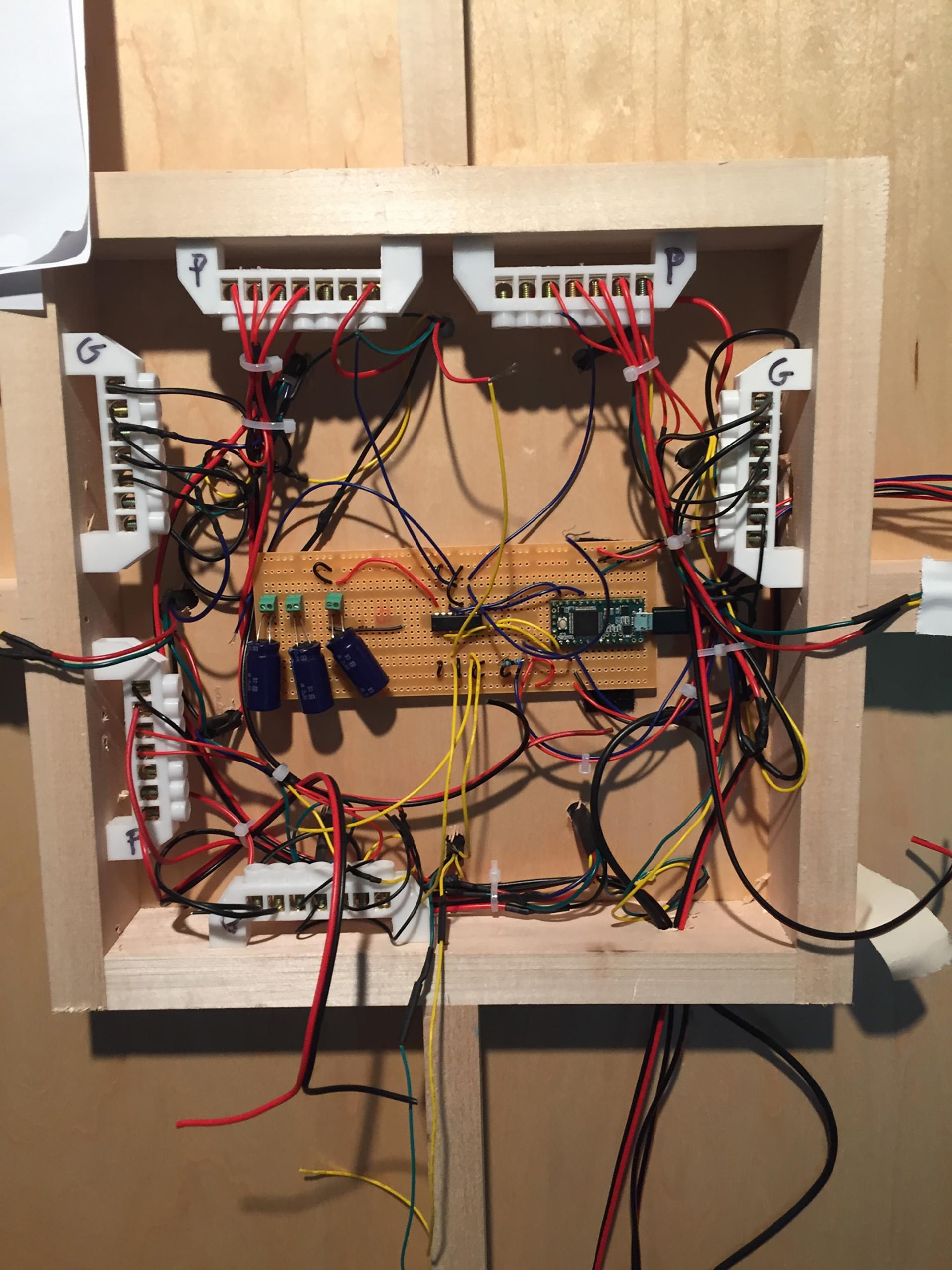 The new circuit, with power connected directly to the LED strips, and the data and clock signal from the Teensy level switched from 3.3v to 5v.
